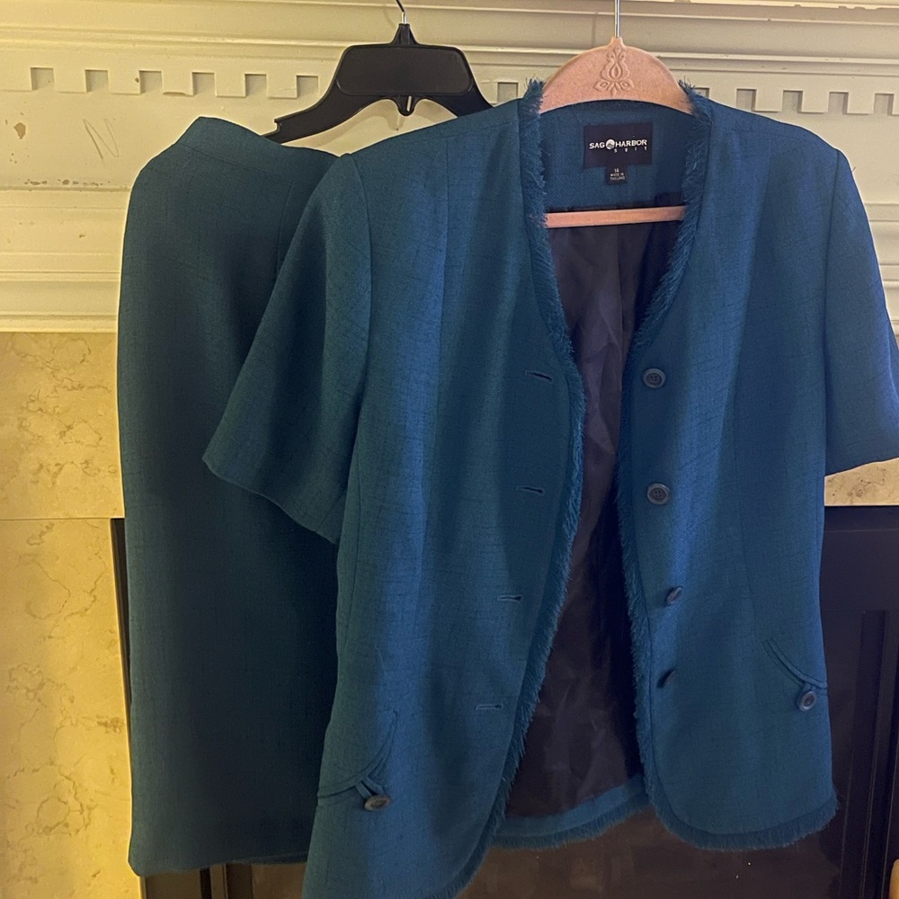Beautiful blue professional skirt and blouse.